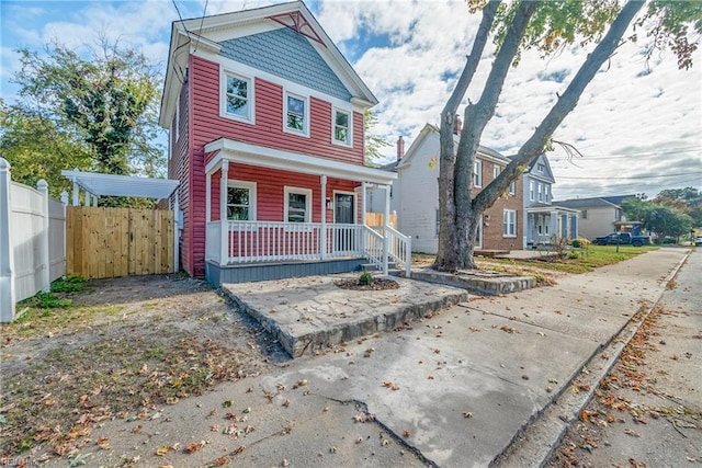 view of front of property featuring covered porch