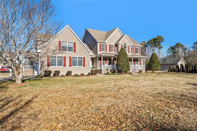 view of front facade featuring a porch and a front lawn