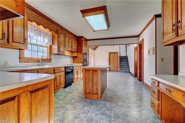 kitchen with a center island, crown molding, built in microwave, sink, and black dishwasher