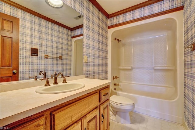 full bathroom featuring toilet, crown molding, shower / bathtub combination, and vanity