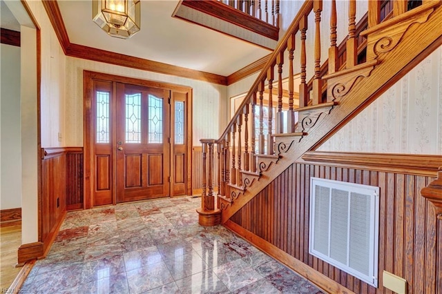 foyer entrance with crown molding