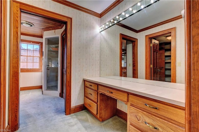 bathroom featuring crown molding and vanity