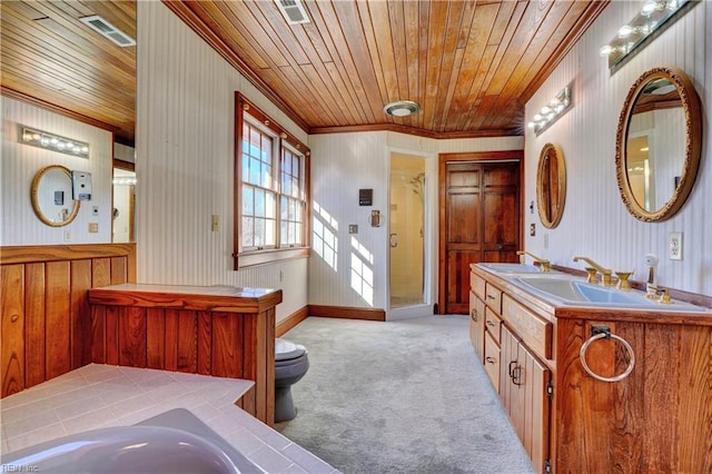 bathroom featuring wooden ceiling, toilet, crown molding, vanity, and a bathing tub