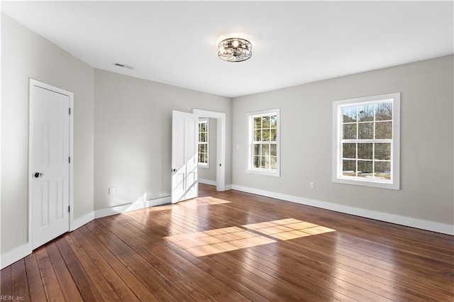 empty room featuring hardwood / wood-style flooring