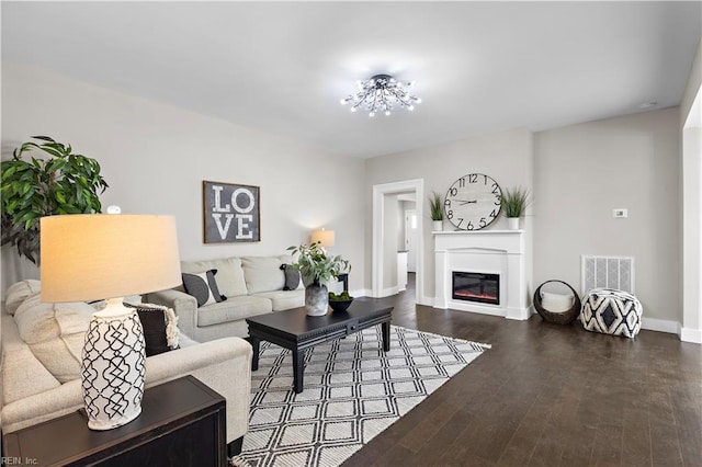 living room featuring dark hardwood / wood-style floors