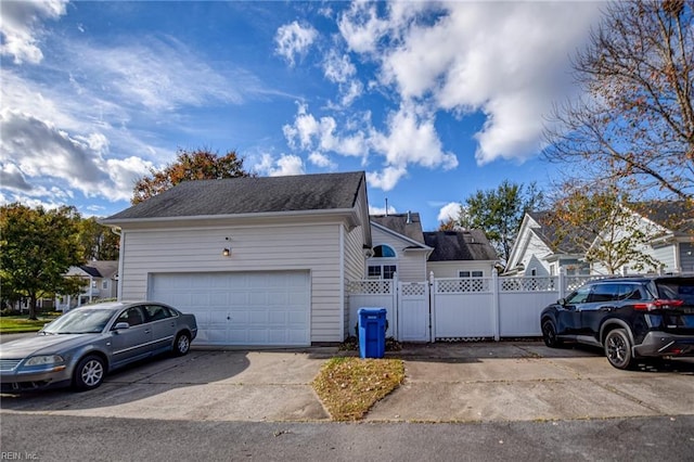 view of property exterior featuring a garage