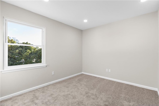 view of carpeted spare room