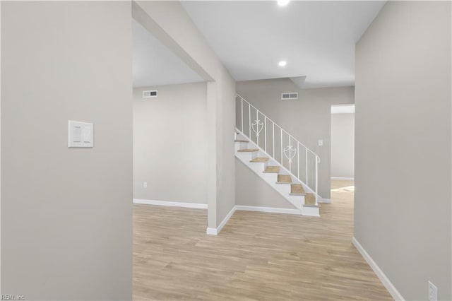 hallway featuring light wood-type flooring