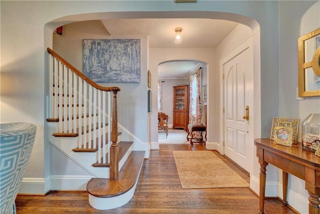 entrance foyer featuring hardwood / wood-style flooring