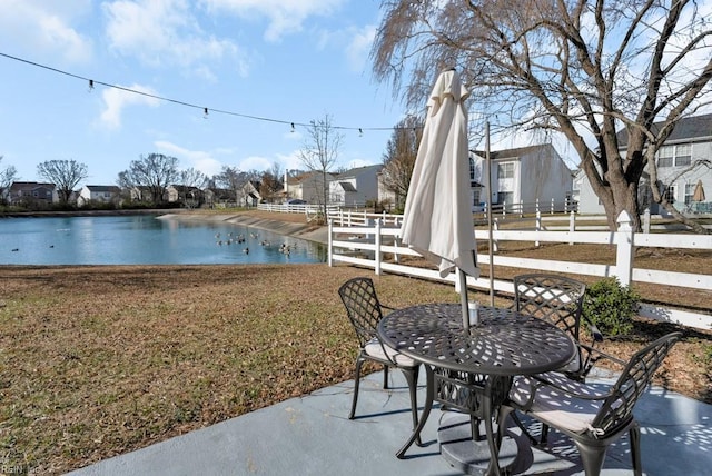 view of patio / terrace featuring a water view