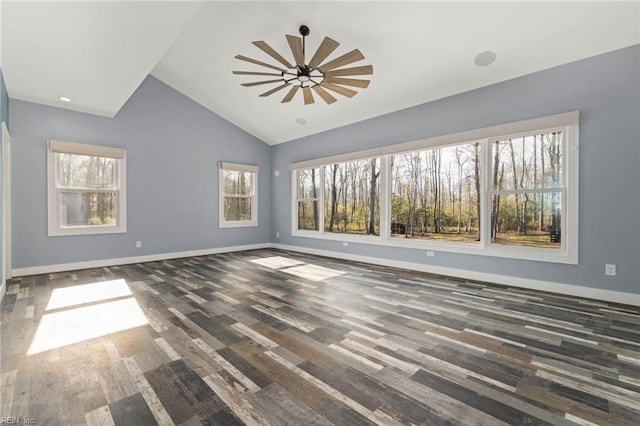 unfurnished living room featuring ceiling fan, dark hardwood / wood-style flooring, and high vaulted ceiling