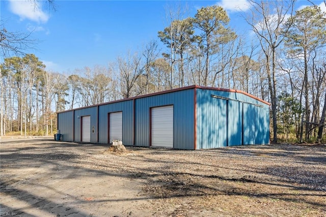 view of outbuilding featuring a garage