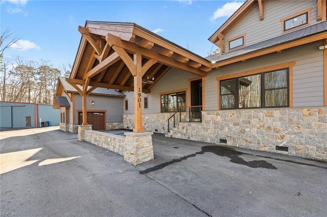 view of front of property featuring a garage