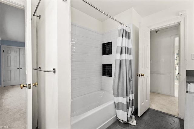 bathroom featuring tile patterned flooring and shower / tub combo with curtain