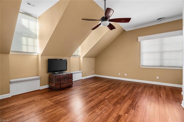 bonus room with ceiling fan, lofted ceiling, and wood-type flooring