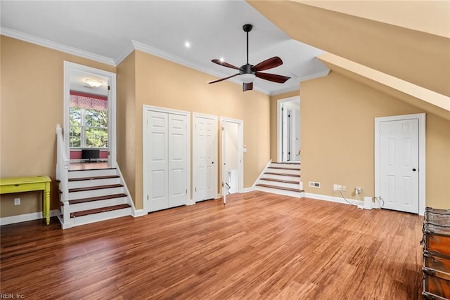 interior space featuring ceiling fan, lofted ceiling, and wood-type flooring