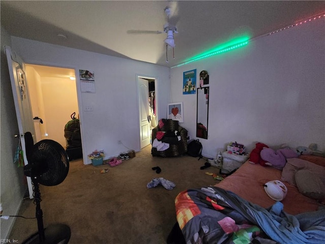 bedroom featuring ceiling fan and carpet floors