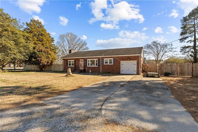 ranch-style home with a garage