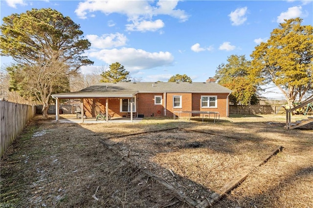 rear view of property with a patio