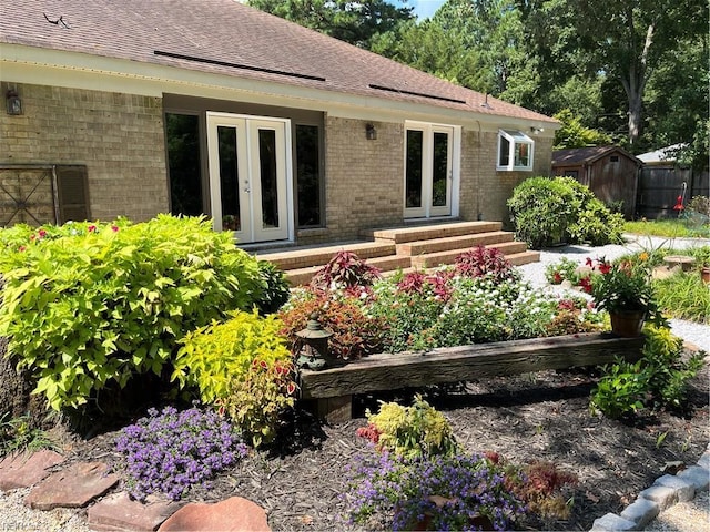 back of house featuring french doors