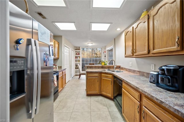 kitchen featuring light tile patterned floors, stainless steel refrigerator with ice dispenser, electric stove, dishwasher, and sink