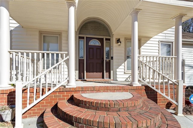 property entrance featuring a porch