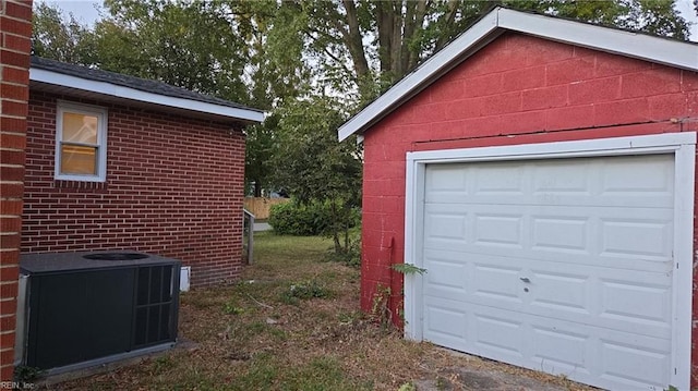 garage with central AC unit