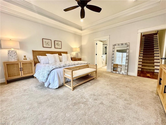 bedroom featuring ceiling fan, ornamental molding, and light carpet