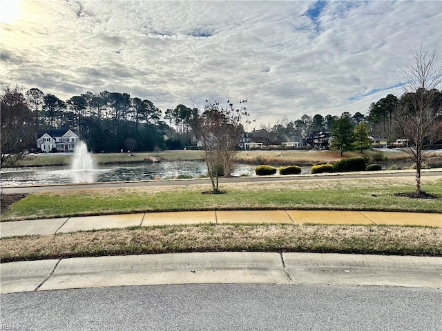 view of property's community featuring a water view