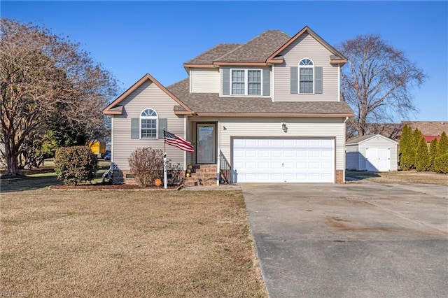 view of front property featuring a shed, a garage, and a front lawn