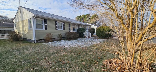 view of front of home with a front yard