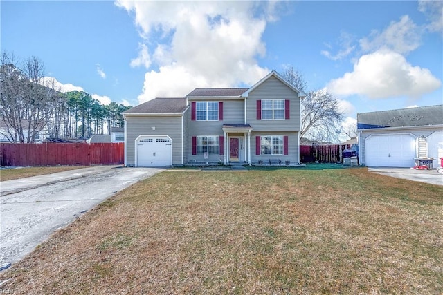 view of front property featuring a garage and a front yard