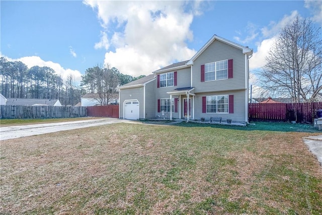 view of front of home featuring a garage and a front lawn