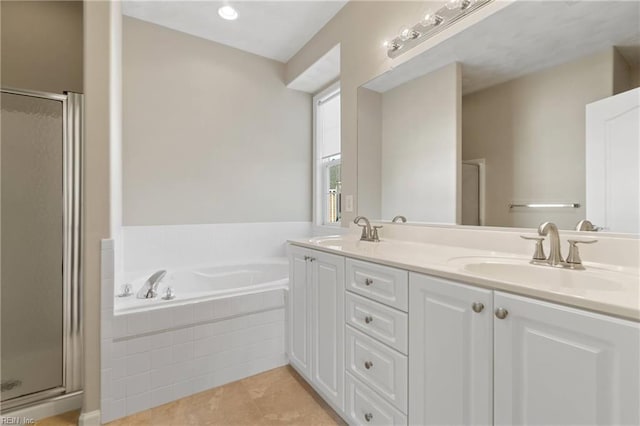 bathroom with tile patterned flooring, plus walk in shower, and vanity