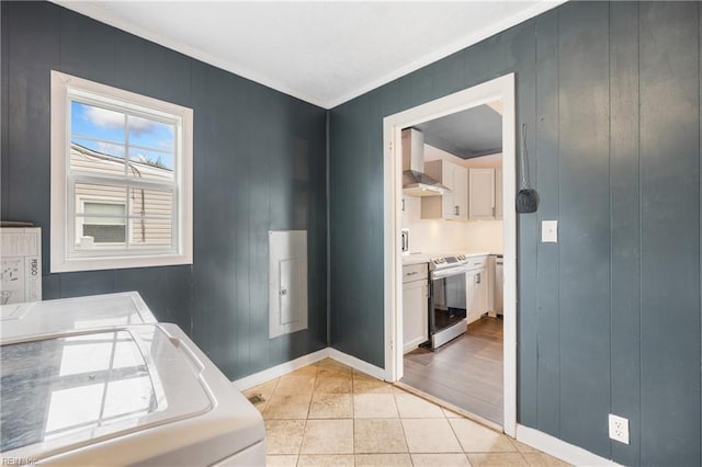 washroom with light tile patterned flooring and washer / clothes dryer