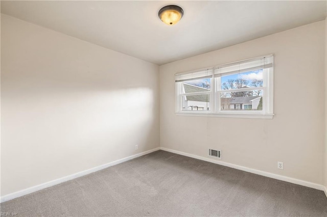 unfurnished room with carpet