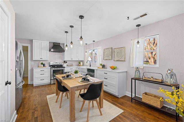 dining room featuring dark hardwood / wood-style flooring and sink