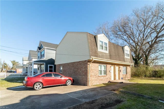 exterior space with a front lawn