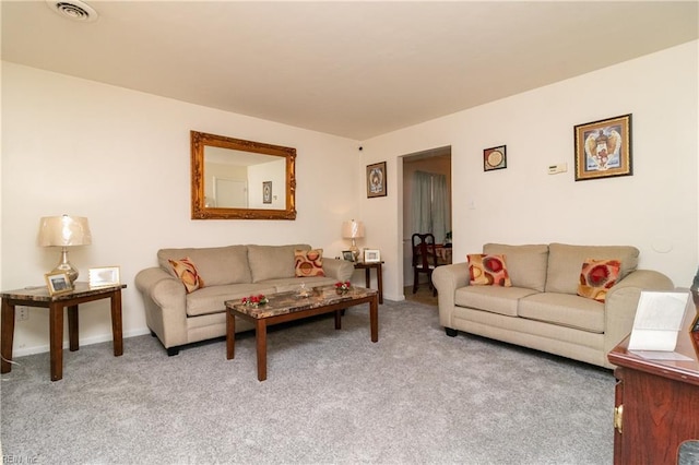 living room with light colored carpet