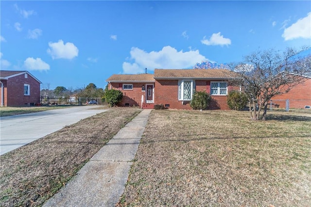 ranch-style house with a front yard