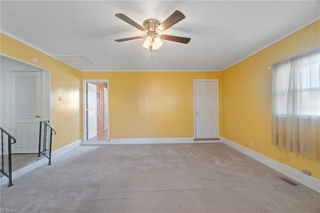 carpeted empty room with ceiling fan