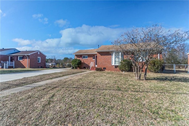 ranch-style house featuring a front lawn