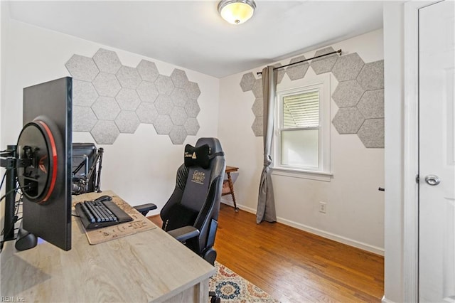 office space with hardwood / wood-style floors