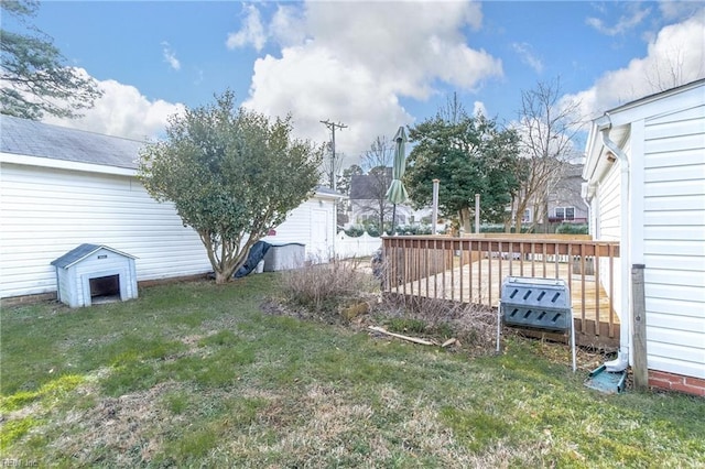 view of yard with a wooden deck