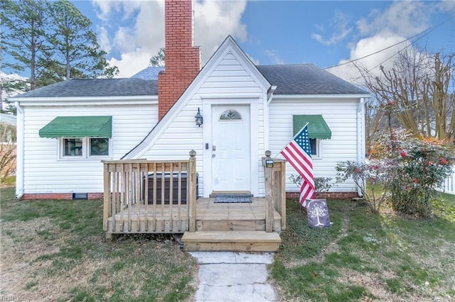 exterior space with a front yard