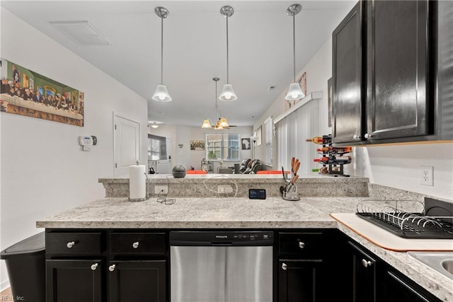 kitchen with decorative light fixtures, an inviting chandelier, and dishwasher