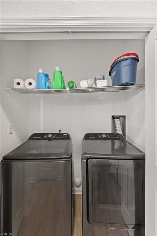 laundry room featuring washer and clothes dryer