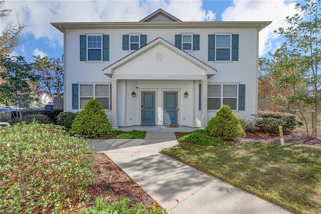 view of front of property with a front lawn