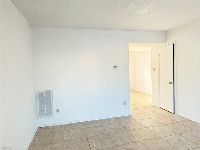 view of tiled empty room