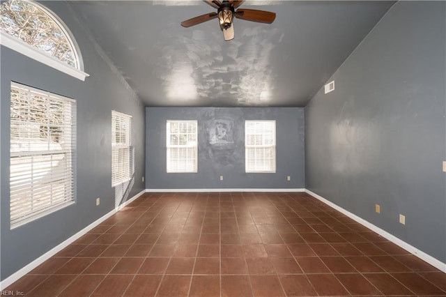 unfurnished room with vaulted ceiling and ceiling fan